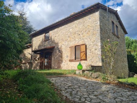 For Sale Farmhouse and Countryhouse COUNTRY SIDE OF SIENA.  A stone house of approximately 200sq.m, featuring a private fenced garden...